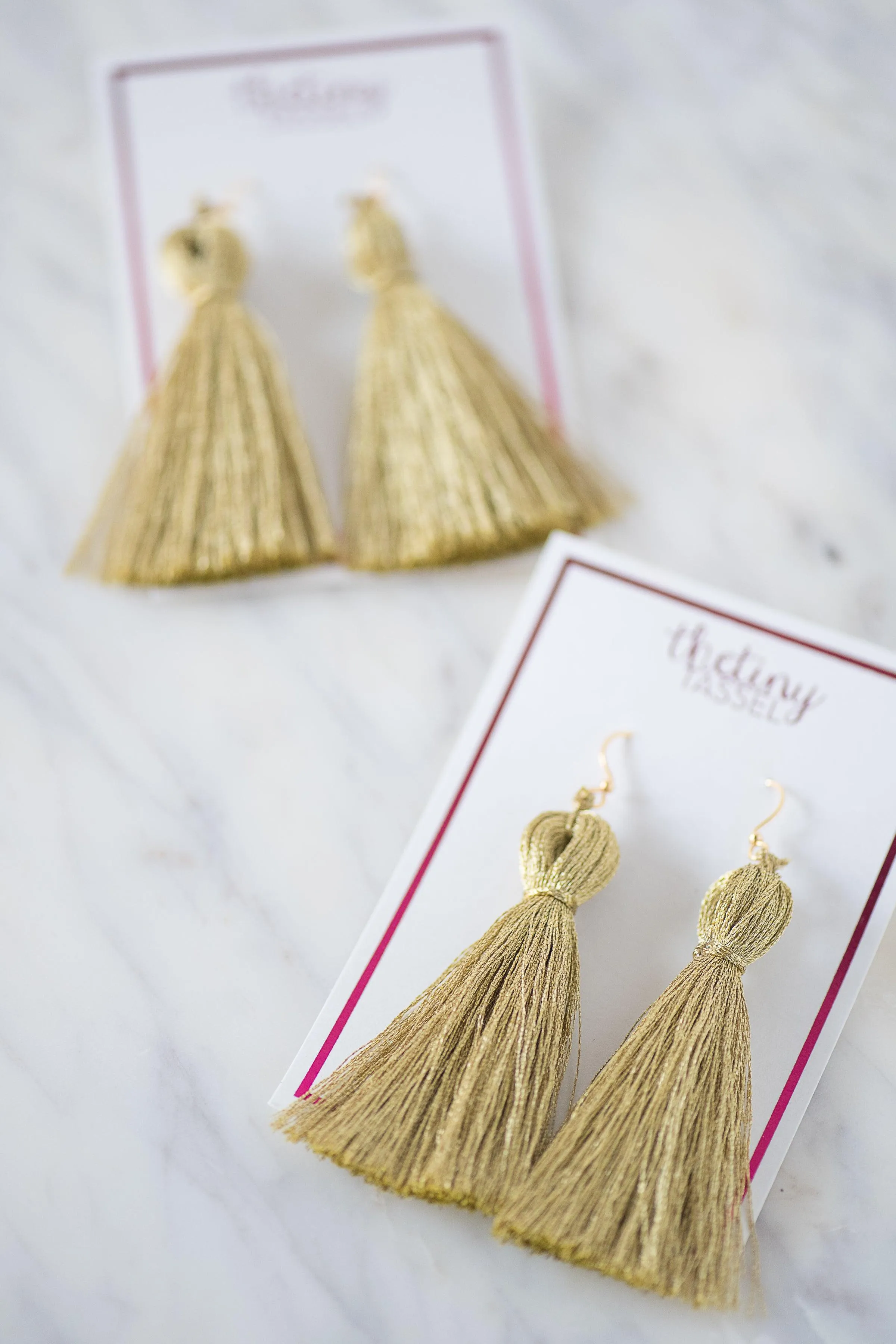 The St. Margaret Tassel Earring in Gold